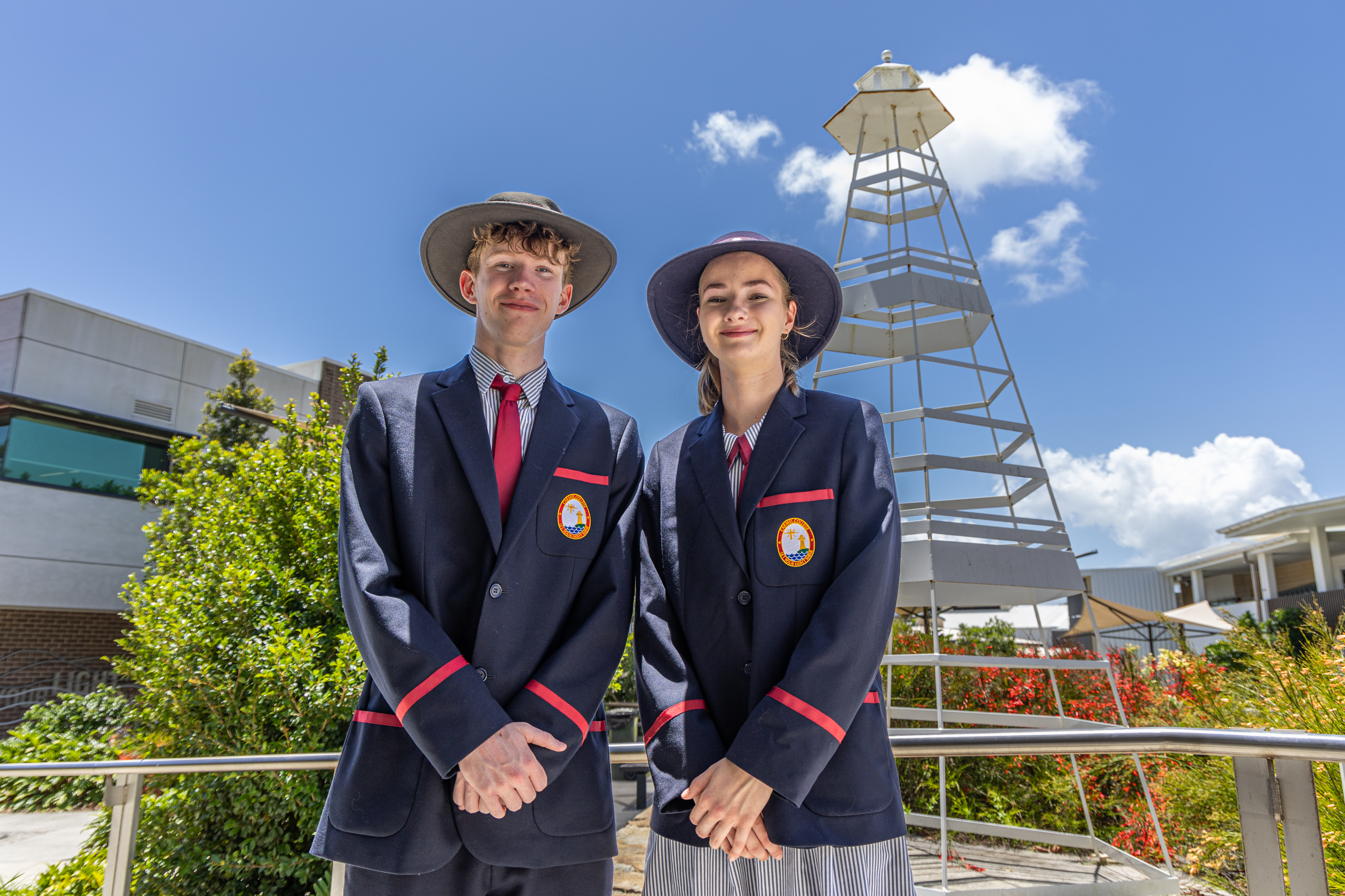 Students in formal uniform at Carmel College Thornlands showcasing leadership pride and a strong sense of school identity within the campus environment
